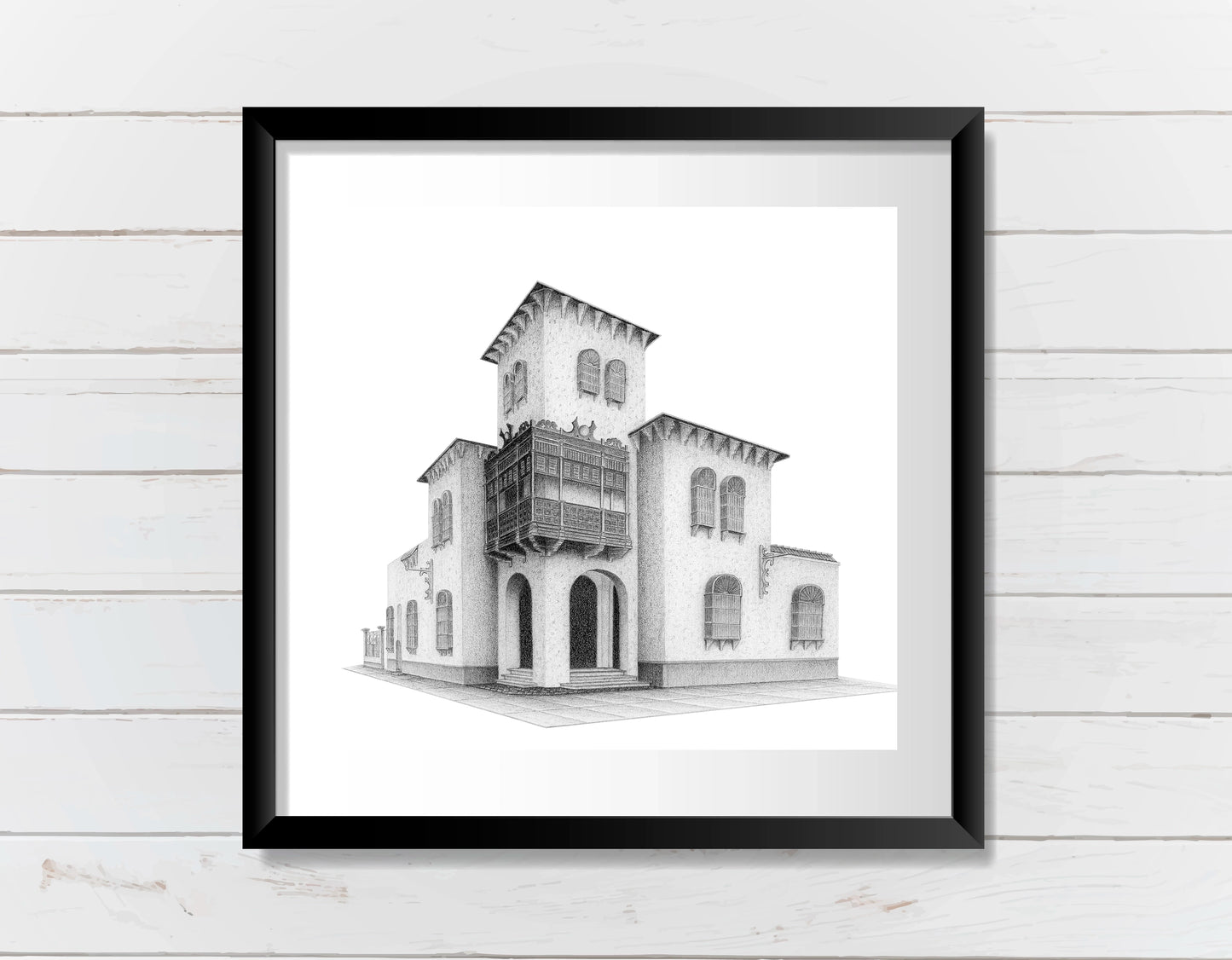 Mockup del balcón limeño en Barranco, imagen digital del dibujo en grafito, simulando enmarcado en negro con paspartú blanco.