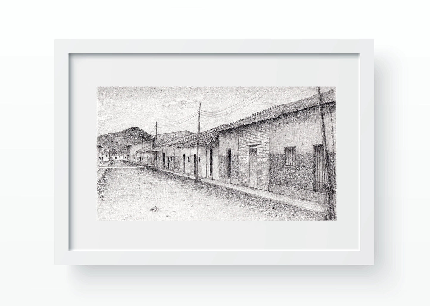 Mockup de una calle en Motupe, Lambayeque. Imagen digital del dibujo en grafito, simulando enmarcado en blanco con paspartú blanco.